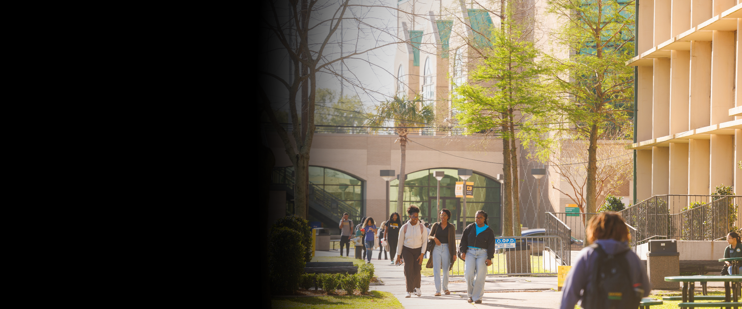 Students walking on XULA's campus