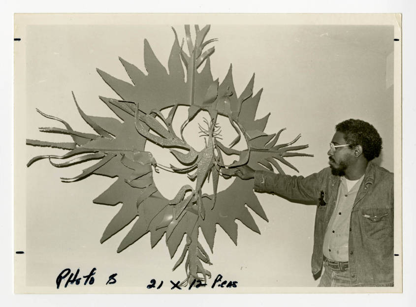 Professor John Scott Examining an Art Piece at Xavier University of Louisiana. This art piece was for the chapel.