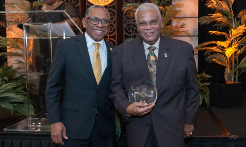 Raymond Bourgeois poses with President Verret at the Homecoming Banquet