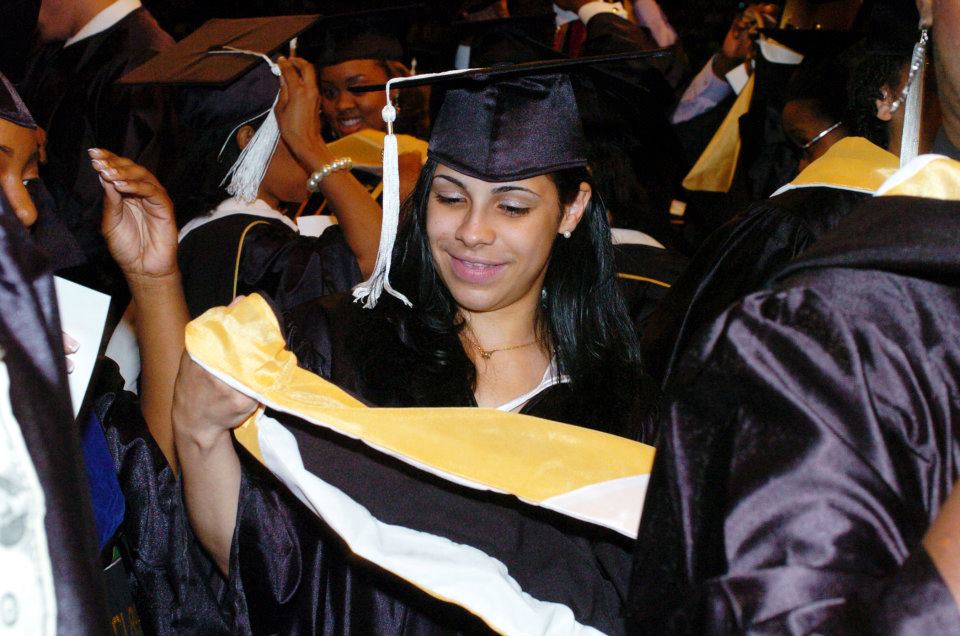 Leslie D. Rose in a graduation cap and gown